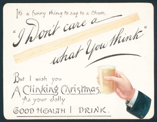 Hand eines Mannes hält Glas, Weihnachtskarte