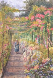 Junges Mädchen unter einer Rosenpergola spazierend