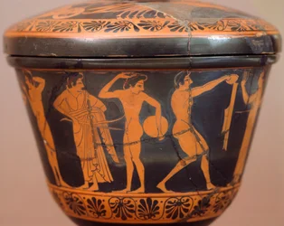 Pyxis mit Athleten, die Diskus und andere Disziplinen ausführen. Rotfigurige Keramik, aus Cerveteri (Latium). Etruskische Zivilisation, 4. Jahrhundert v. Chr.