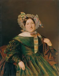 Frau in grünem, lachsrot changierendem Kleid