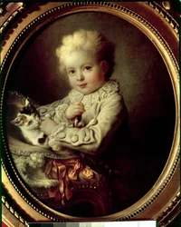 Porträt eines jungen Jungen, der mit einer Katze spielt