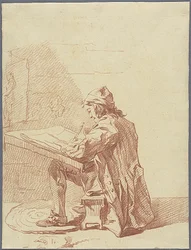 Ein Künstler in seinem Atelier skizzierend