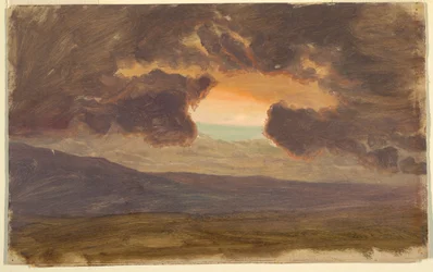 Sonnenuntergang über kahlen Hügeln