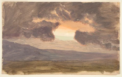 Sonnenuntergang über kahlen Hügeln