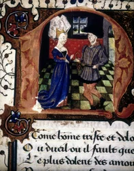 Ein Mann bietet einer Dame einen Ring an (Lettrine „n“).