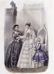 Eine Frau im Hochzeitskleid, umgeben von einem Mädchen und einer Dame - im „Journal des Demoiselles“ 1852.