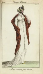Modische Frau mit Strohhut, Kleid und Schal