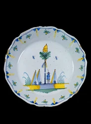 Teller dekoriert mit dem Freiheitsbaum, gepflanzt am Fuß von drei Zelten