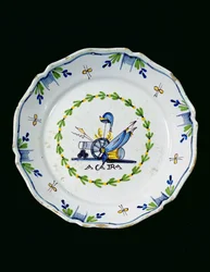 Teller dekoriert mit dem Satz A ça ira