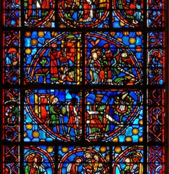 Fenster w10, Darstellung typologischer alttestamentlicher Szenen: die Spione und die Trauben; David und der Pelikan; zwei Passah-Szenen