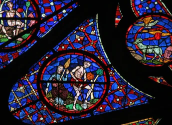 Fenster w115, Adam beim Graben und Eva beim Spinnen darstellend