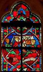 Fenster w209 zeigt eine Szene aus einer Legende des Heiligen Nikolaus: ein Teufel gibt Reisenden eine Flüssigkeit, aber die Flasche geht über Bord verloren