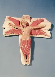 Geflügelter Christus am Kreuz