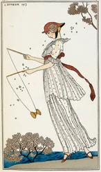 Eine Frau in einem bedruckten weißen Leinenkleid spielt mit einem Spielzeug