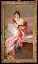 Junge Frau in Rosa im Atelier des Malers