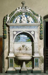 Dekorierter Brunnen mit einem Hochrelief aus Marmor und Terrakotta von Giovanni della Robbia (1469-1529) 1498. Sakristei von Santa Maria Novella, Florenz