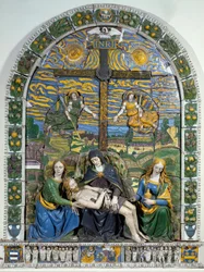 Die Kreuzabnahme (Pieta) Jesus Christus und die Jungfrau Maria umgeben von Johannes und Maria Magdalena vor dem Kreuz mit der Inschrift INRI. Flachreliefkeramik von Giovanni della Robbia (1469-1529)