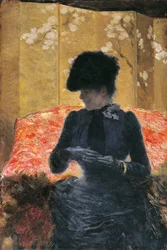 Frau auf rotem Sofa