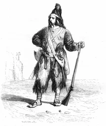 Porträt von Robinson Crusoe auf seiner einsamen Insel mit seinem Gewehr und seinen dazu passenden Waffen am Gürtel - Grandville-Illustration des Romans von Daniel Defoe (De Foe) - Garnier-Ausgabe 1869, S. 155.