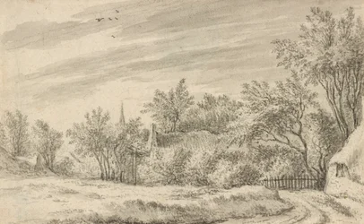 Dorfweg mit Kirchturm in der Ferne