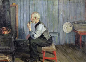 Mann in blauer Küche