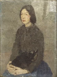 Mädchen mit Katze auf dem Schoß