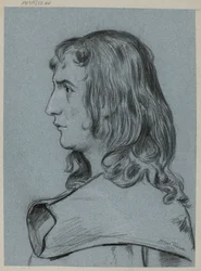 Profil eines jungen Mannes mit langen Haaren