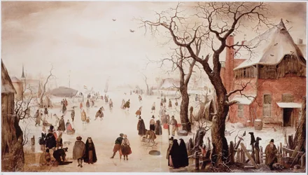 Winterlandschap met schaatsers bij een dorp