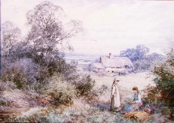 Zwei junge Mädchen, die auf einer Wiese spielen