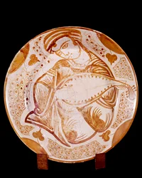 Keramikteller mit einem Lautenspieler