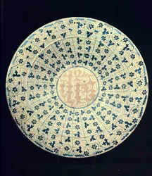 Gelber und blauer Teller, maurisch (Faience)