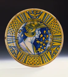 Porträtschale aus Deruta, bemalt in Blau und gelustert in Gelb, Darstellung eines Kriegers mit Helm und geflügeltem Greif, ca. 1525