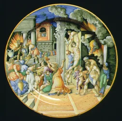 Majolikaplatte, die die Verbrennung von Troja darstellt, mit Aeneas, der seinen Vater Anchises auf dem Rücken trägt, und seinem Sohn Ascanius an seiner Seite, italienisch