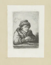 Erwachsener Mann an einem Tisch, in Pelzmantel