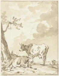 Zwei Kühe bei einem Baum