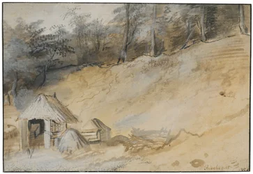 Sandiger Hang mit einer Hütte