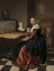 Frau spielt Virginal