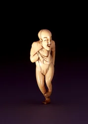 Netsuke eines pferdegesichtigen, kuppelköpfigen Mannes, wahrscheinlich Osaka, ca. 1800-20
