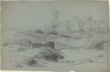 Eine felsige Wiese an einem Fluss