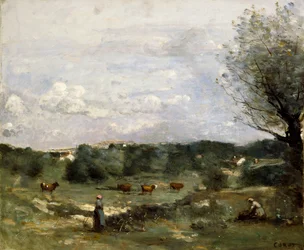Wiese mit Kühen, eine Weide rechts und ein entferntes Dorf