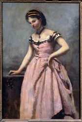 Junges Mädchen im rosa Kleid