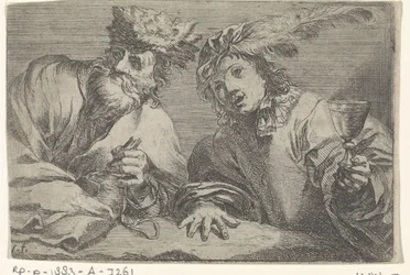 Alter und junger Mann an einem Tisch