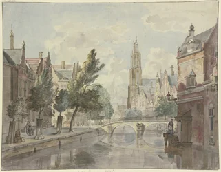 Steinbrücke über einen Kanal, im Hintergrund eine Kathedrale, rechts am Haus eine Laterne