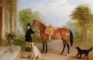 Ein Stallknecht mit einem Pferd