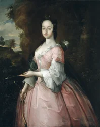 Diana Pryce mit den Attributen der Diana