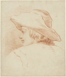 Kopf eines Jungen mit großem Hut