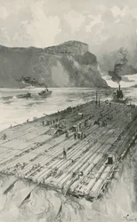 Ein Holzfloß wird den St. Lawrence hinuntergeschleppt