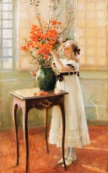 Ein junges Mädchen arrangiert Frühlingsblumen