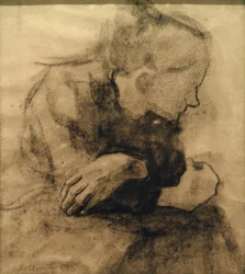 Sitzende Arbeiterfrau