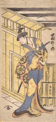 Der Schauspieler Nakamura Noshio II in Frauenrolle, hält eine Shakuhachi, 1796